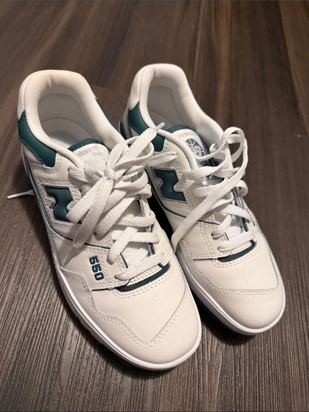 New Balance woman’s 550 White and Teal Low-Top Sneakers